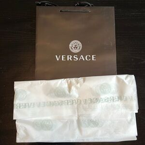 Versace shopping bag and tissue paper.